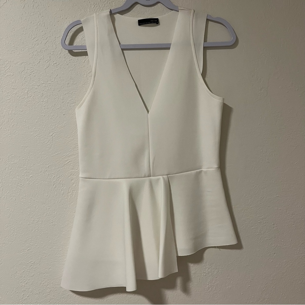 Zara White Sleeveless Peplum Blouse